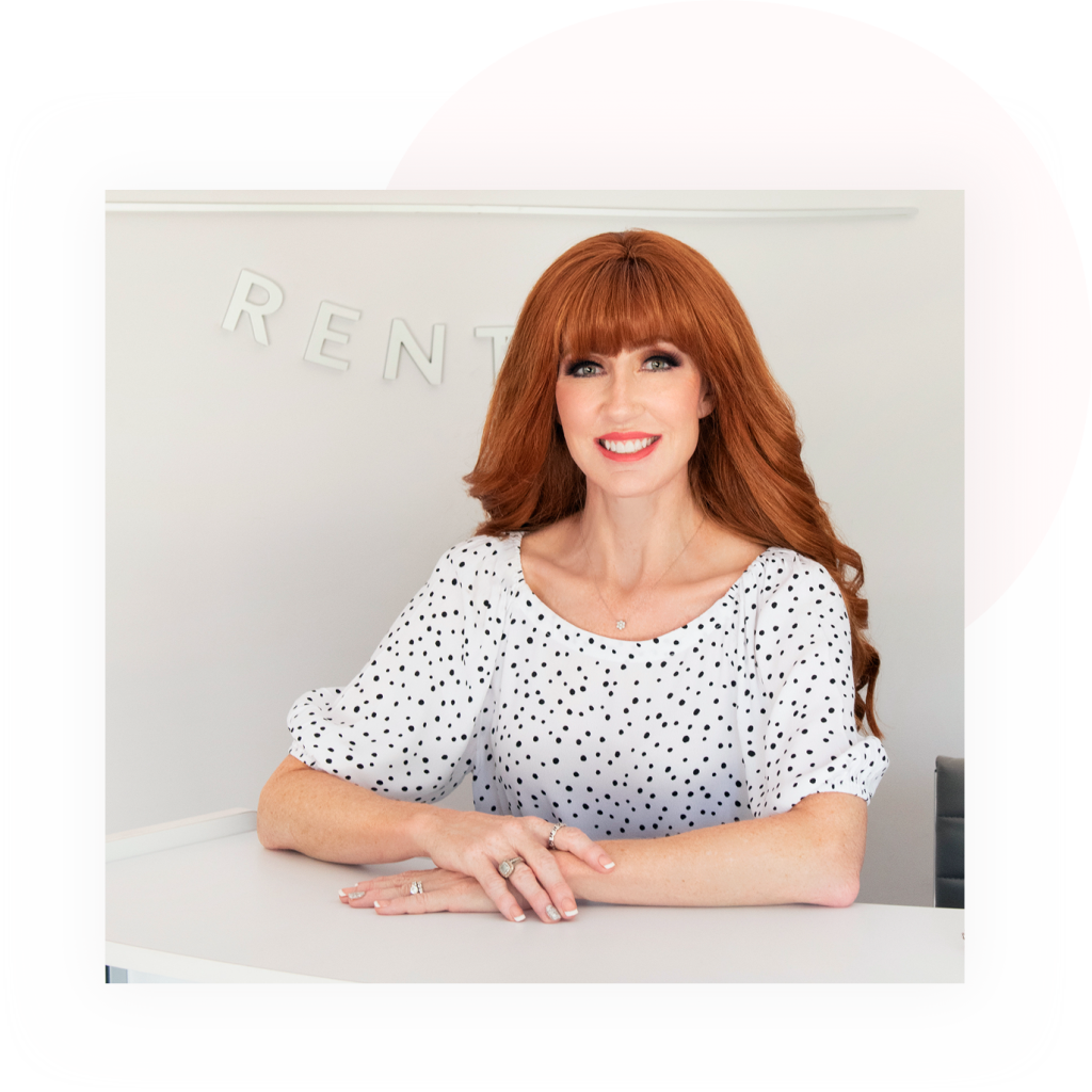 Ginger sitting at desk